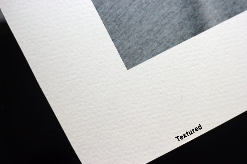 Close-up of a photo printed on textured cotton rag fine art paper