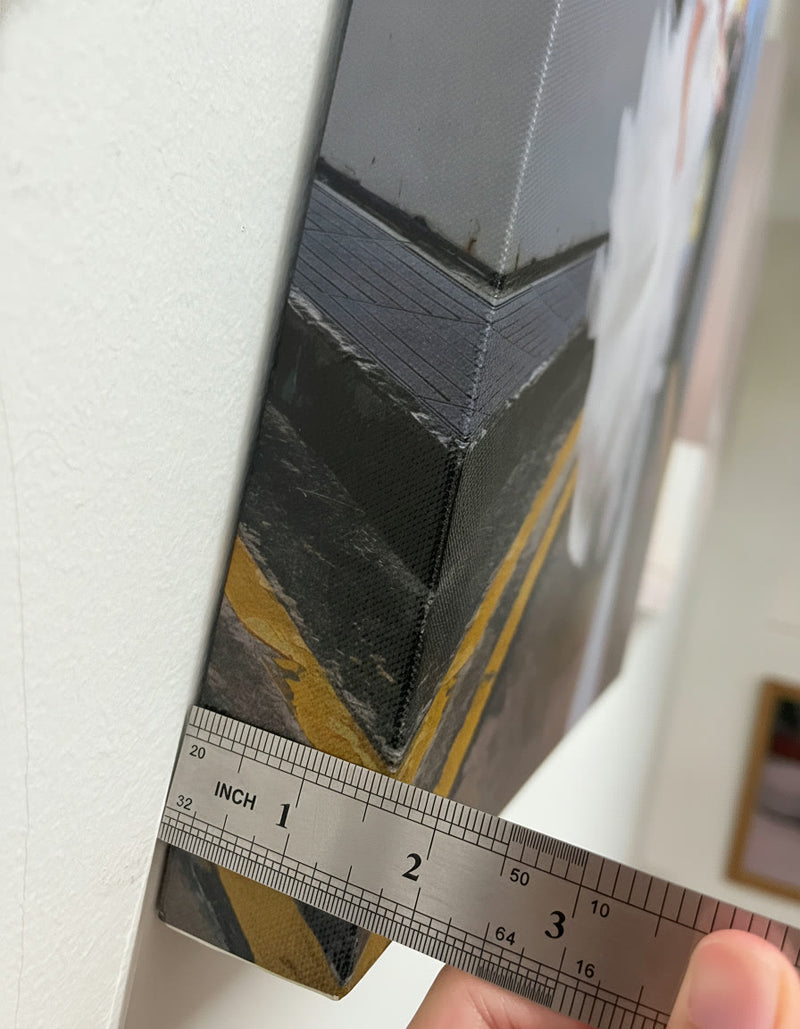 Ruler against the edge of a KT Colour canvas showing the 1.5 inch stretcher bar
