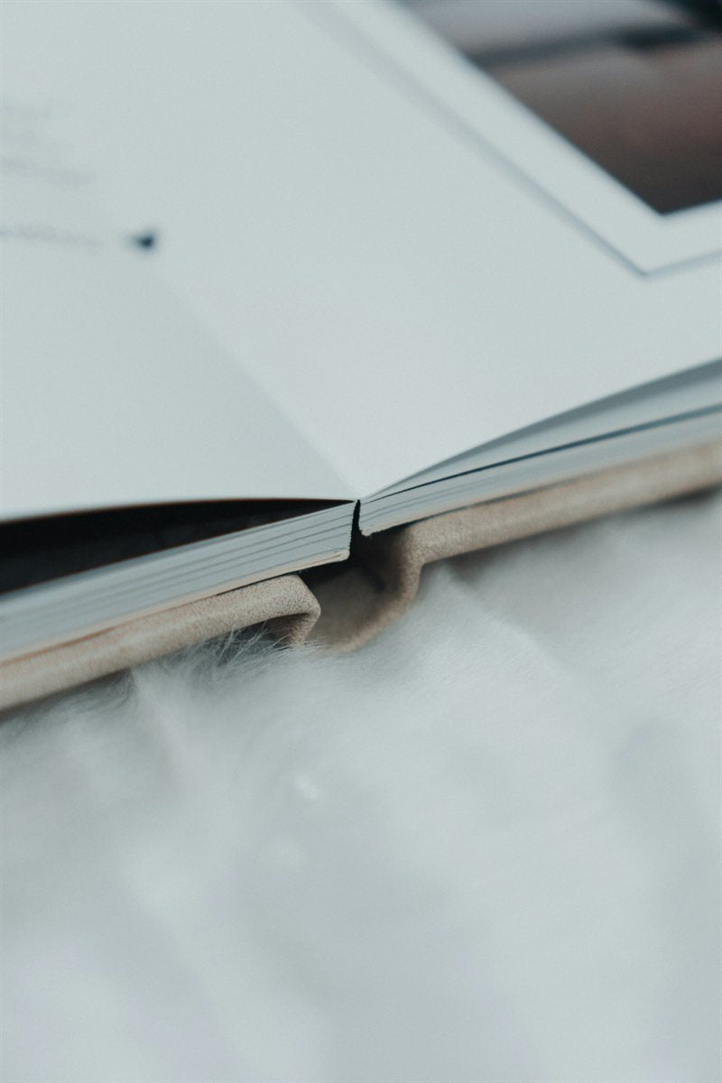 Close-up of lay-flat photo book binding